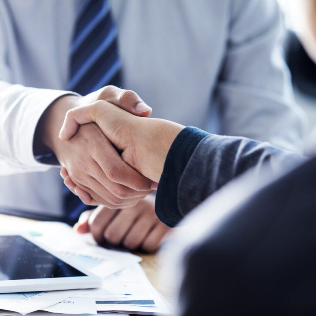 Business handshake in the office